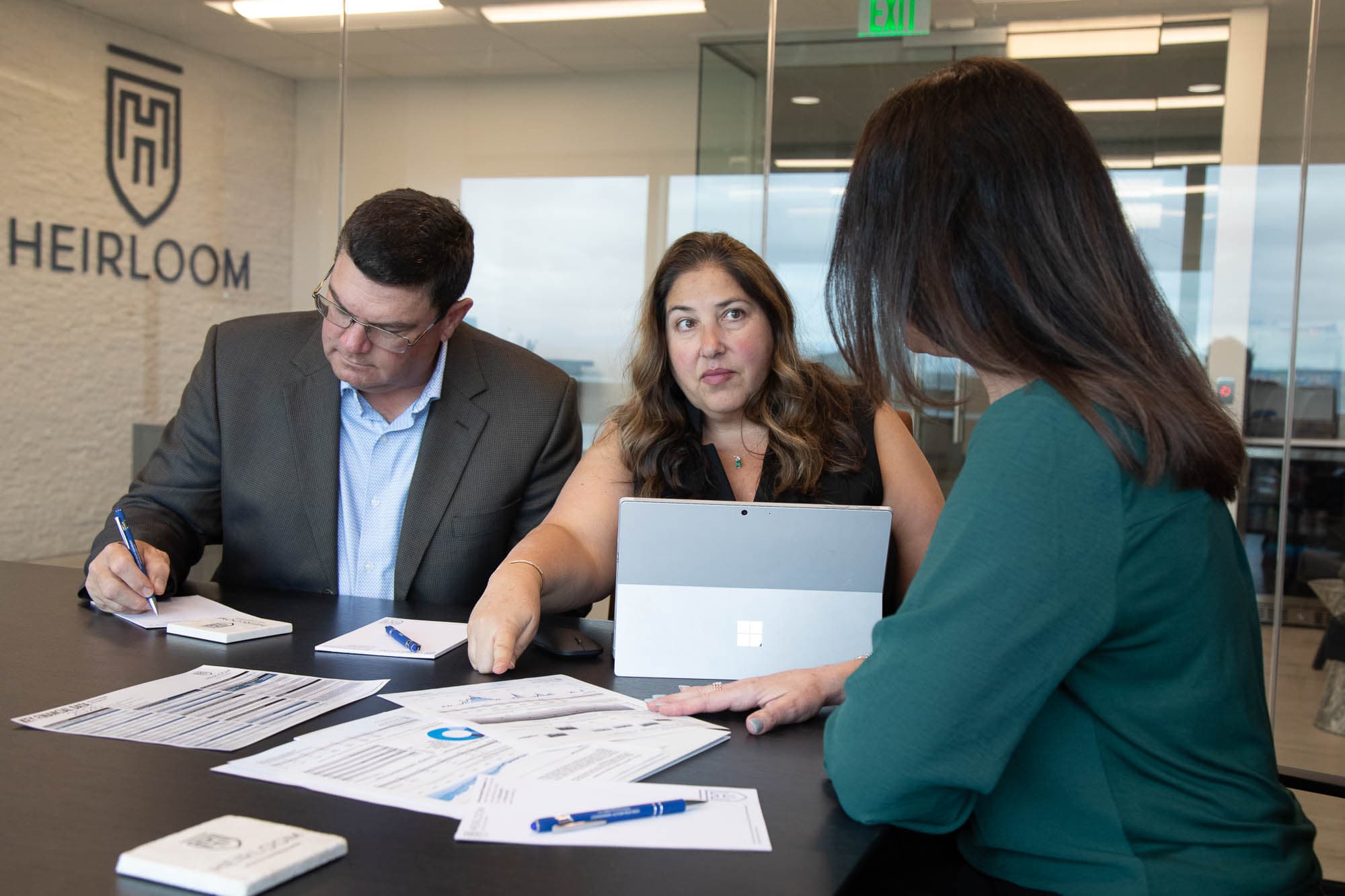 Heirloom advisor providing calm, focused financial guidance to a client