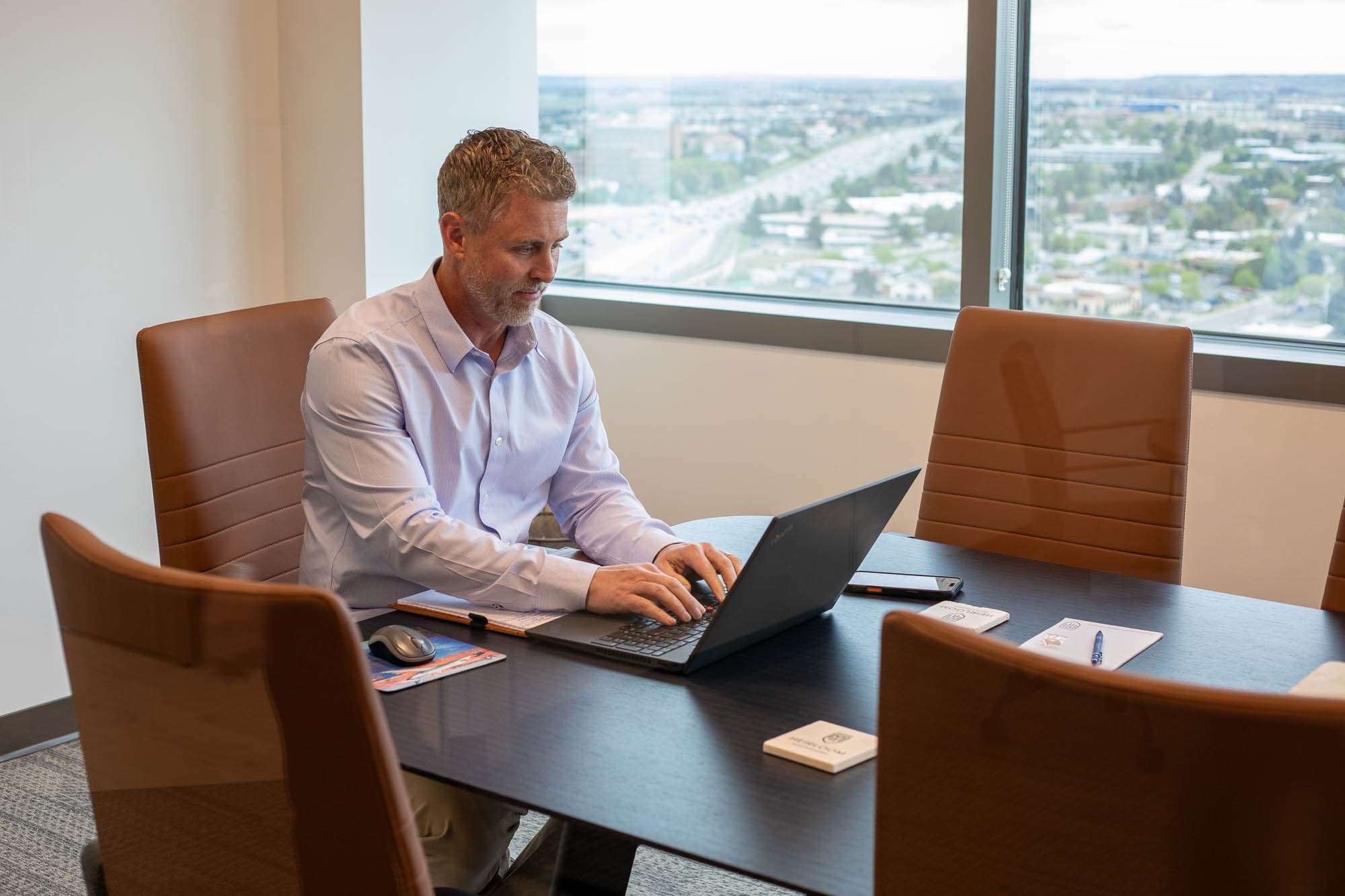 Advisor presenting a business succession roadmap to a small business owner