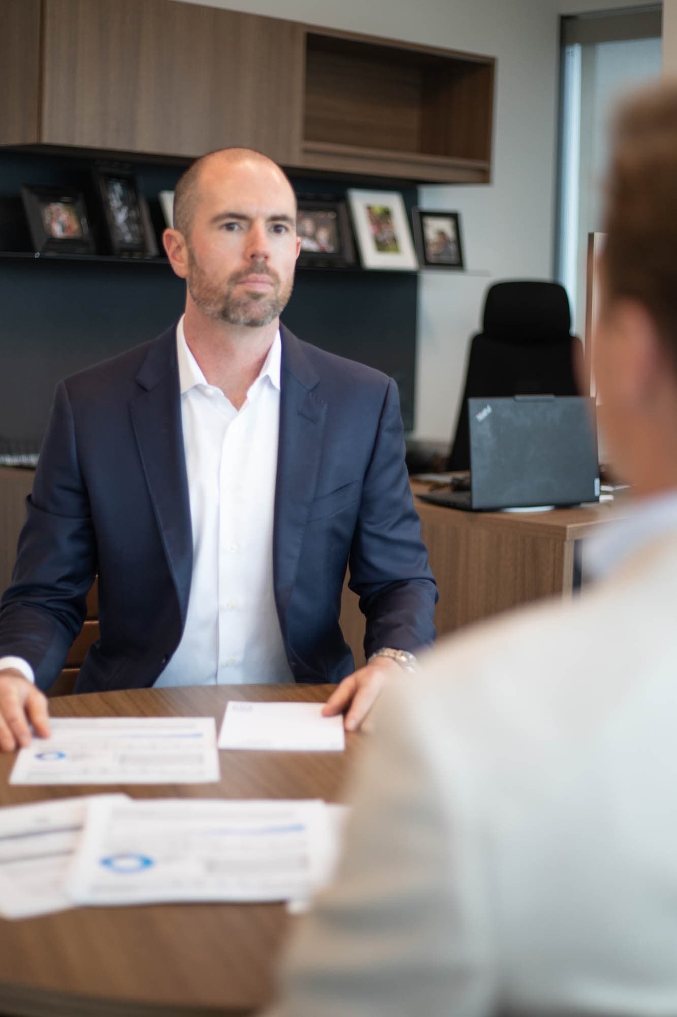 Advisor showing a debt payoff projection and net worth trajectory to a client
